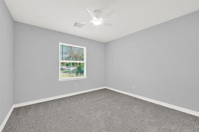 11423 Raincove Dr, Houston, TX 77016 - carpeted spare room featuring ceiling fan and baseboards