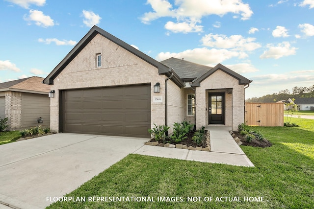 20614 Draper Rd, Tomball, TX 77377 - view of front facade featuring an attached garage, driveway, brick siding, and a front lawn