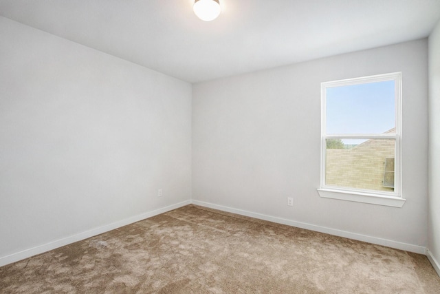 40557 Mostyn Lake Dr, Magnolia, TX 77354 - carpeted spare room with baseboards