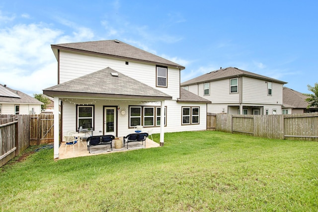 40557 Mostyn Lake Dr, Magnolia, TX 77354 - rear view of property with a shingled roof and a patio