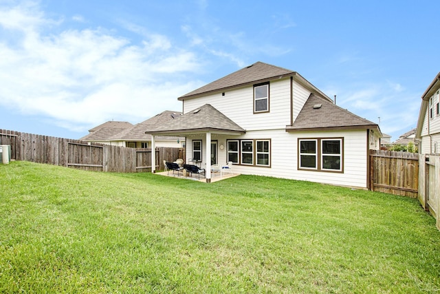 40557 Mostyn Lake Dr, Magnolia, TX 77354 - rear view of property featuring roof with shingles and a patio