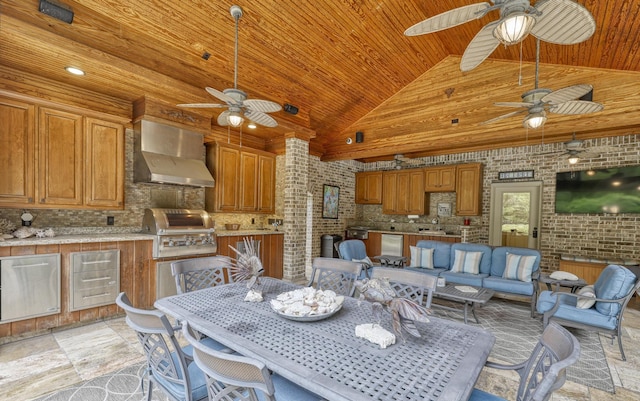 4503 Summits Edge Ln, Katy, TX 77494 - dining space featuring ceiling fan, wooden ceiling, high vaulted ceiling, and brick wall