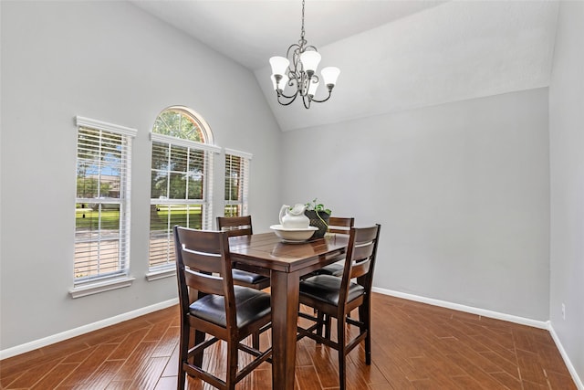 5810 Dixie Ln, Baytown, TX 77523 - dining room featuring vaulted ceiling, a chandelier, and dark wood-style flooring
