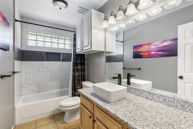 5810 Dixie Ln, Baytown, TX 77523 - bathroom featuring vanity, shower / bath combo with shower curtain, and tile patterned flooring