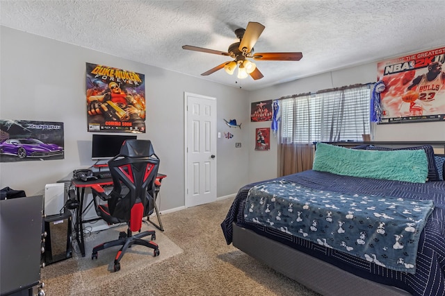 5810 Dixie Ln, Baytown, TX 77523 - carpeted bedroom featuring a textured ceiling, an office area, and a ceiling fan