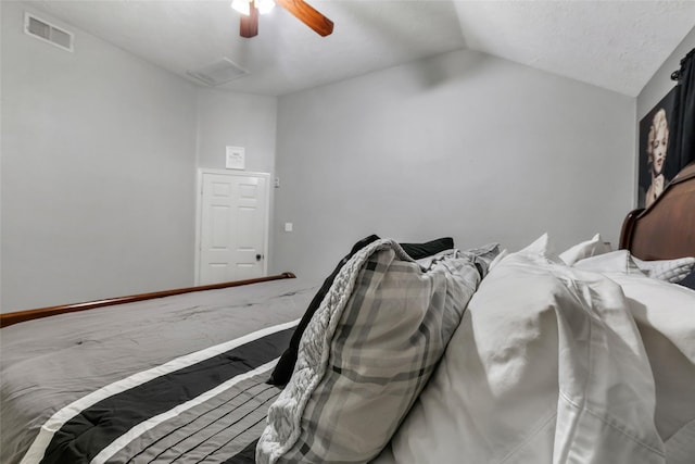 5810 Dixie Ln, Baytown, TX 77523 - bedroom with lofted ceiling and a ceiling fan