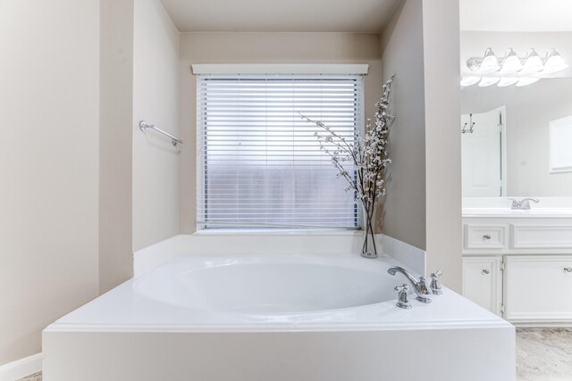 2215 Dali Ln, Missouri City, TX 77459 - bathroom featuring a bath and vanity