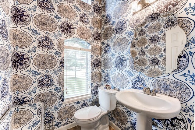 2215 Dali Ln, Missouri City, TX 77459 - half bath with toilet, healthy amount of natural light, and wallpapered walls