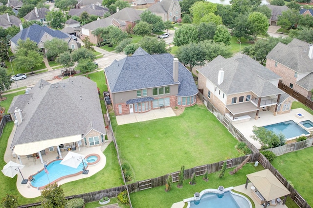 2215 Dali Ln, Missouri City, TX 77459 - aerial perspective of suburban area featuring a pool