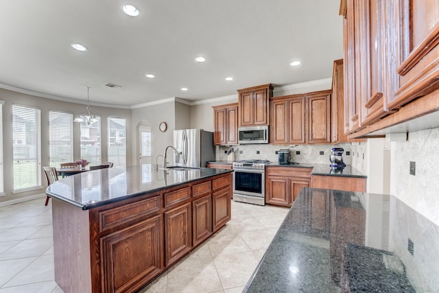 2215 Dali Ln, Missouri City, TX 77459 - kitchen with stainless steel appliances, a sink, brown cabinetry, crown molding, and recessed lighting