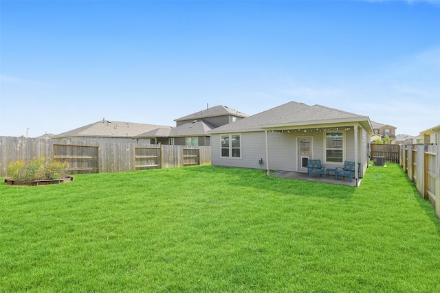 16910 Elm Grove Rd, Conroe, TX 77302 - rear view of property with a patio, central air condition unit, and a shingled roof