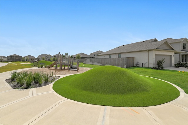 16910 Elm Grove Rd, Conroe, TX 77302 - view of yard featuring a playground, a garage, and a residential view