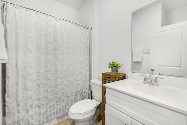 16910 Elm Grove Rd, Conroe, TX 77302 - bathroom with vanity, toilet, wood finished floors, and a shower with curtain