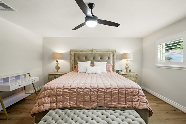 10718 Chevy Chase Dr, Houston, TX 77042 - bedroom featuring wood finished floors and a ceiling fan