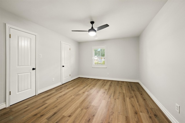 10718 Chevy Chase Dr, Houston, TX 77042 - unfurnished bedroom with wood finished floors and a ceiling fan