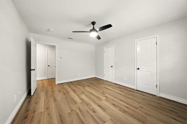 10718 Chevy Chase Dr, Houston, TX 77042 - unfurnished bedroom with light wood-style floors and ceiling fan