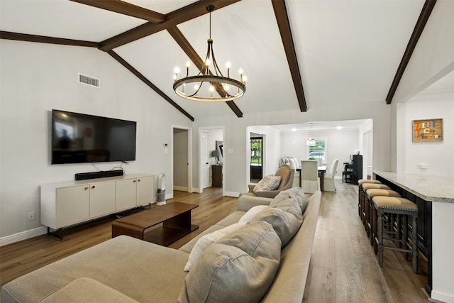 10718 Chevy Chase Dr, Houston, TX 77042 - living room featuring a chandelier and light wood-type flooring