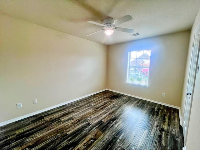 6442 Wilshire Lks, Houston, TX 77040 - empty room featuring dark wood-type flooring and a ceiling fan
