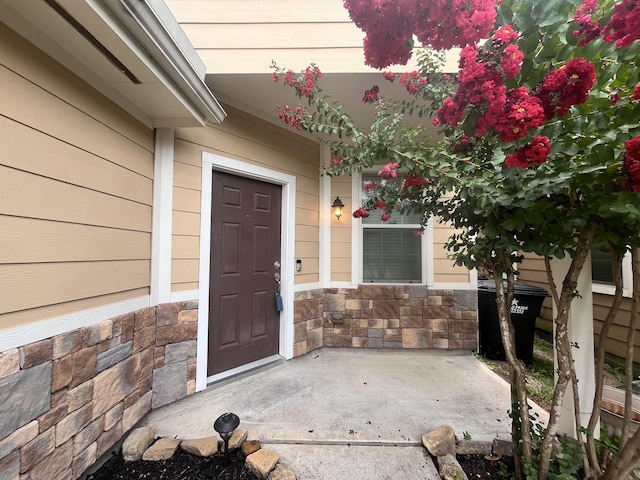 6442 Wilshire Lks, Houston, TX 77040 - property entrance with stone siding