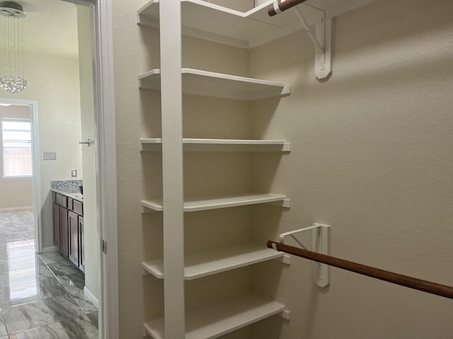 6442 Wilshire Lks, Houston, TX 77040 - spacious closet with light marble finish floors