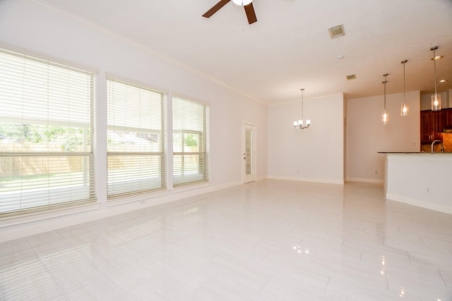 6402 Amelia Springs Dr, Spring, TX 77379 - unfurnished living room with ceiling fan, ornamental molding, a chandelier, a sink, and baseboards