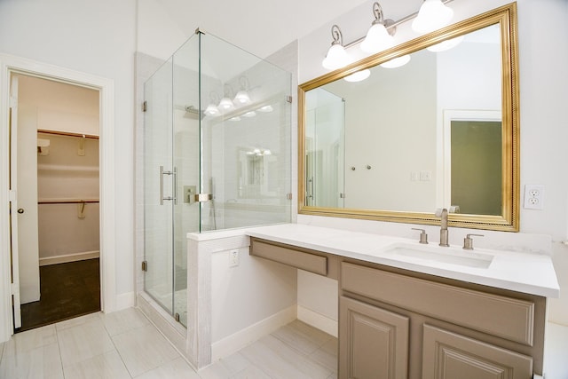 6402 Amelia Springs Dr, Spring, TX 77379 - bathroom with a shower stall, a spacious closet, vanity, and tile patterned flooring