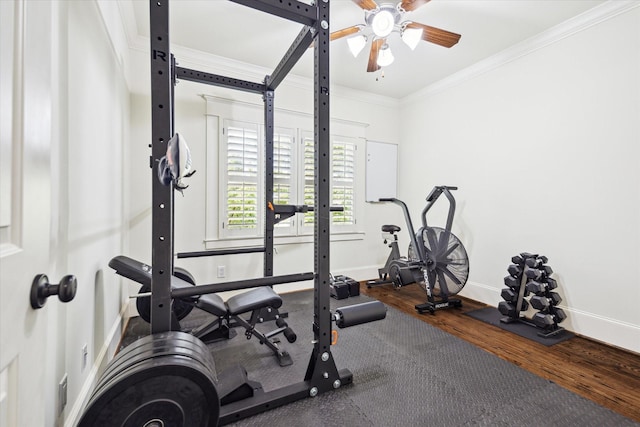 1136 Nadine St, Houston, TX 77009 - workout area featuring ornamental molding, ceiling fan, baseboards, and wood finished floors