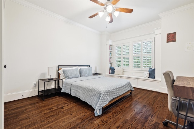 1136 Nadine St, Houston, TX 77009 - bedroom with dark wood-style flooring, ornamental molding, and a ceiling fan