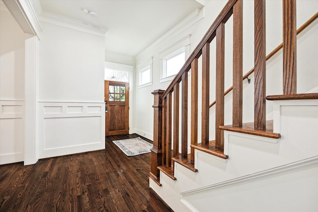 1136 Nadine St, Houston, TX 77009 - entrance foyer featuring dark wood-style flooring, crown molding, and stairs
