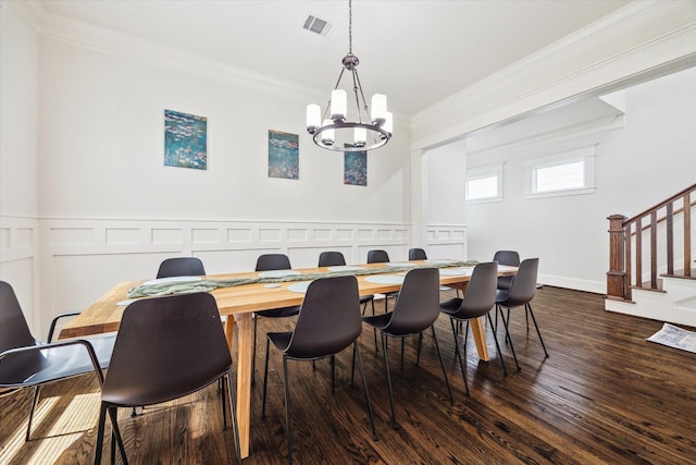 1136 Nadine St, Houston, TX 77009 - dining room with crown molding, stairway, a chandelier, and dark wood-style flooring