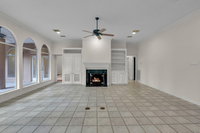 10 Champions Bend Cir, Houston, TX 77069 - unfurnished living room featuring a ceiling fan, a lit fireplace, ornamental molding, and baseboards