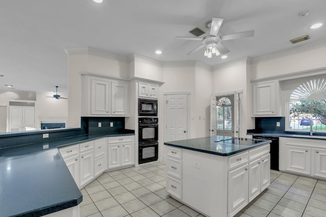 10 Champions Bend Cir, Houston, TX 77069 - kitchen featuring a ceiling fan, black appliances, decorative backsplash, light tile patterned floors, and a sink
