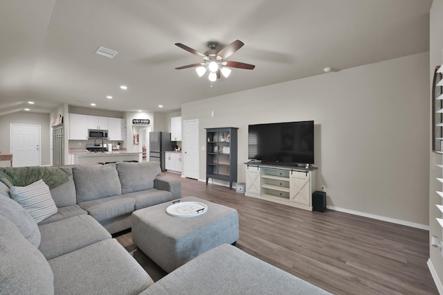 1887 Brushy Cedar Dr, Conroe, TX 77301 - living room with ceiling fan, recessed lighting, dark wood-style flooring, and baseboards