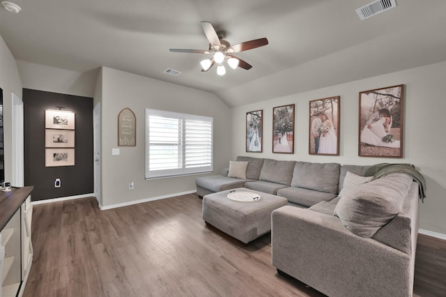 1887 Brushy Cedar Dr, Conroe, TX 77301 - living area featuring a ceiling fan, wood finished floors, vaulted ceiling, and baseboards