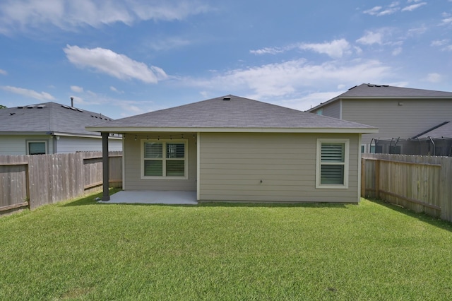 1887 Brushy Cedar Dr, Conroe, TX 77301 - rear view of house featuring a patio and roof with shingles