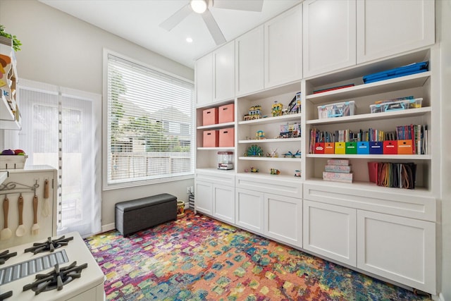 818 Garden Rose Ln, Houston, TX 77018 - rec room with a ceiling fan and carpet