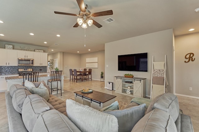 13919 Leigh Lake Ln, Conroe, TX 77384 - living area with ceiling fan and recessed lighting
