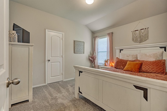 13919 Leigh Lake Ln, Conroe, TX 77384 - bedroom with light carpet and vaulted ceiling