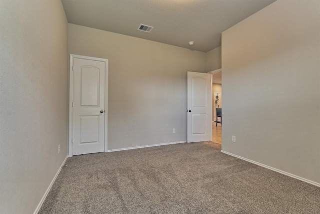 13919 Leigh Lake Ln, Conroe, TX 77384 - unfurnished bedroom featuring carpet flooring and baseboards