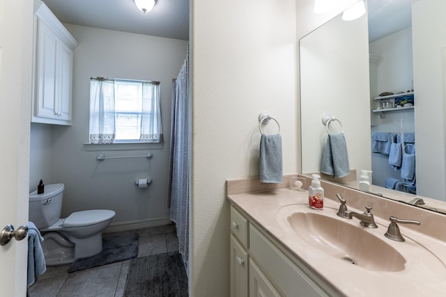 2312 W Green Briar Dr, Huntsville, TX 77340 - full bathroom featuring toilet, vanity, and tile patterned flooring