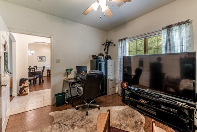 2312 W Green Briar Dr, Huntsville, TX 77340 - office space with ceiling fan, arched walkways, and wood finished floors