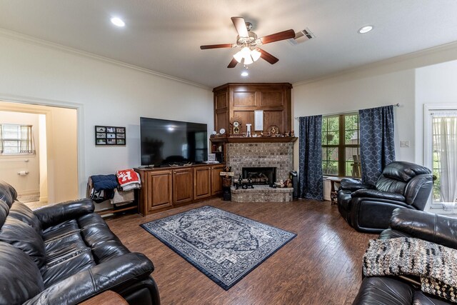 2312 W Green Briar Dr, Huntsville, TX 77340 - living area featuring crown molding, ceiling fan, wood finished floors, a fireplace, and recessed lighting