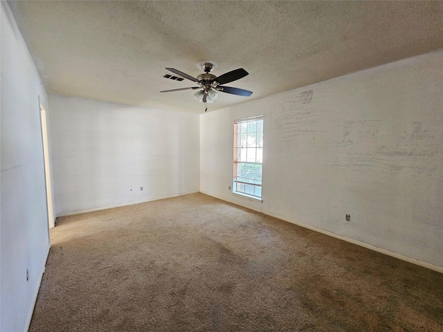 16438 Glenshannon Dr, Houston, TX 77059 - carpeted empty room featuring a textured ceiling and a ceiling fan