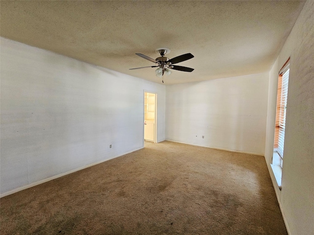 16438 Glenshannon Dr, Houston, TX 77059 - unfurnished room featuring ceiling fan, carpet floors, and a textured ceiling