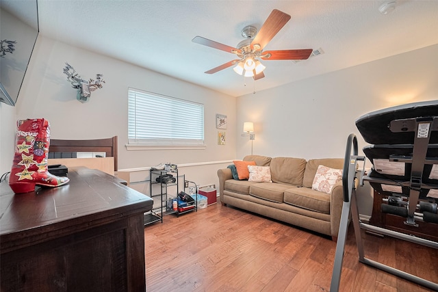 16418 Crawford St, Jersey Village, TX 77040 - living room with light wood-type flooring and a ceiling fan