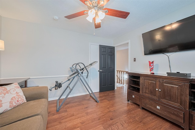 16418 Crawford St, Jersey Village, TX 77040 - living area with light wood-style floors and a ceiling fan