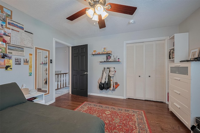 16418 Crawford St, Jersey Village, TX 77040 - bedroom featuring wood finished floors, a closet, a ceiling fan, and a textured ceiling