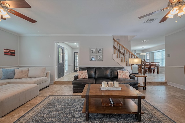 16418 Crawford St, Jersey Village, TX 77040 - living area with ceiling fan, stairs, crown molding, and tile patterned floors