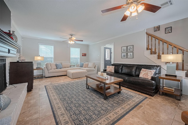 16418 Crawford St, Jersey Village, TX 77040 - living area with a ceiling fan, ornamental molding, stairs, and light tile patterned floors