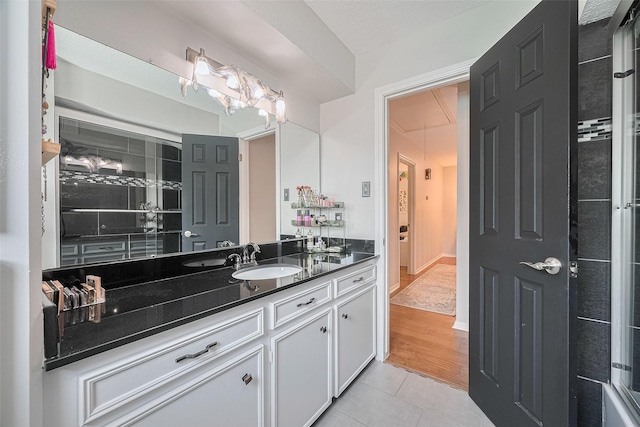 16418 Crawford St, Jersey Village, TX 77040 - bathroom with vanity and tile patterned flooring